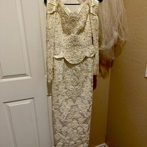 Very elegant detailed sequin wedding dress with a beautiful extravagant train.